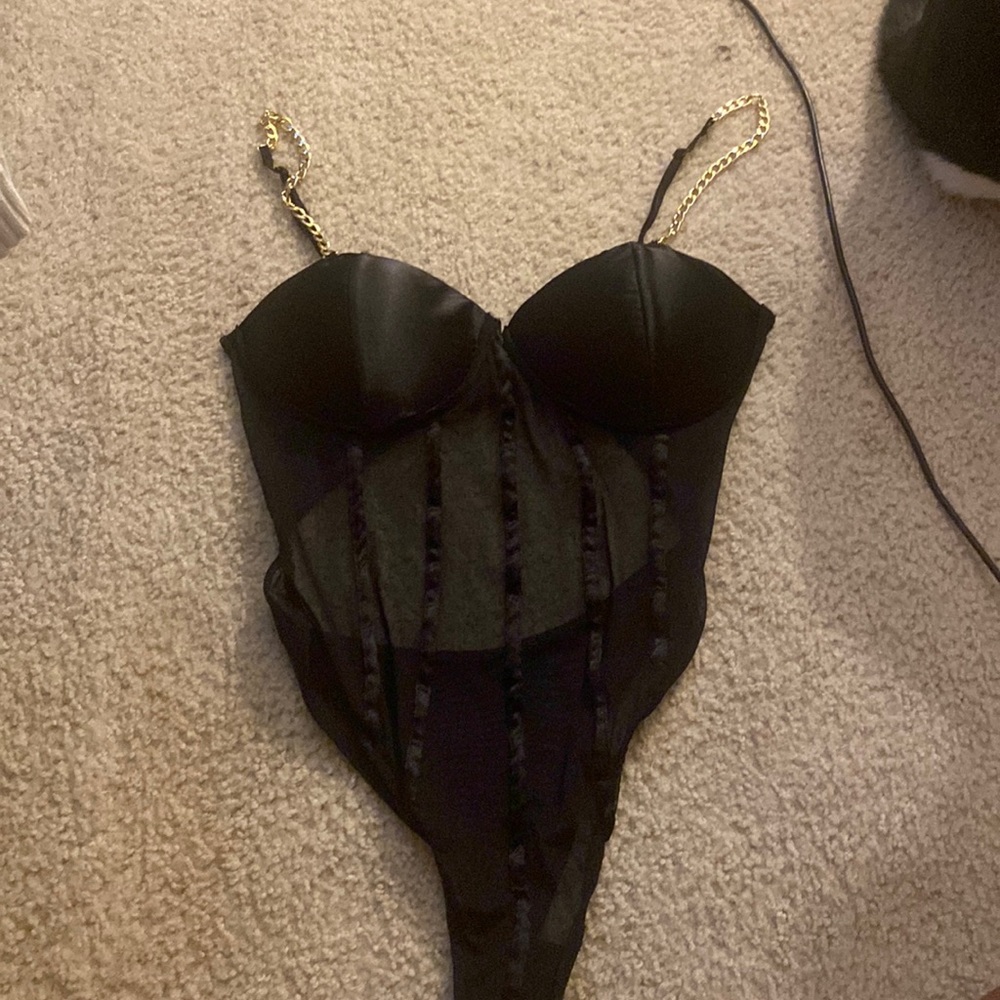 Black mesh bodysuit with gold chain straps